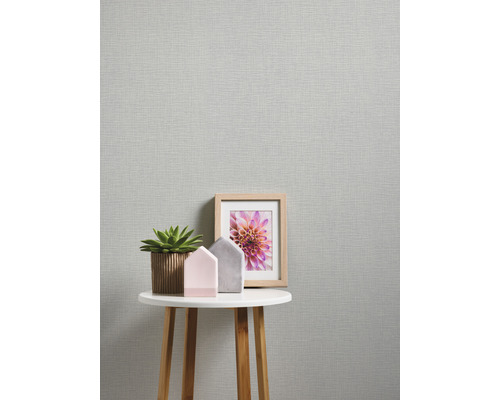 Närbild av en strukturtapet med dekoration på ett bord