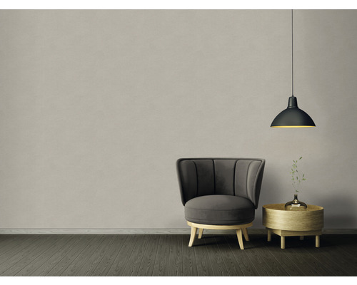 Rumsdesign med fåtölj, sidobord och hänglampa