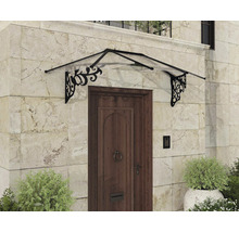 Glasöverdrag med blomdekorationer ovanför en trädörr