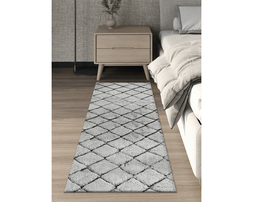 Matta med rombmönster i sovrummet