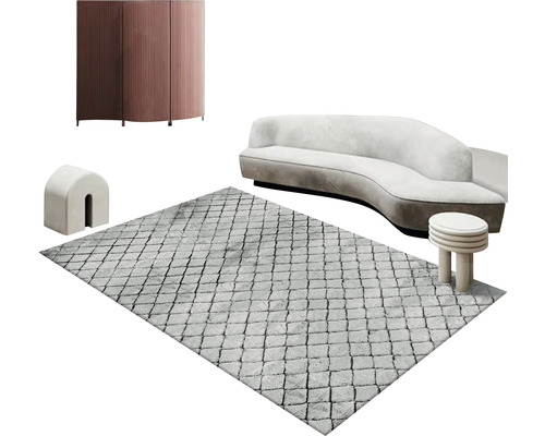 Inredning med matta, soffa, skåp och sidobord