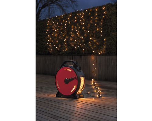 Ljusslinga KONSTSMIDE Sladdvinda 800 amber LED svart soft kabel 55,93m IP44 Dekorativ ljusslinga med upprullare för utomhusbruk för stämningsfull belysning av trädgård eller terrass