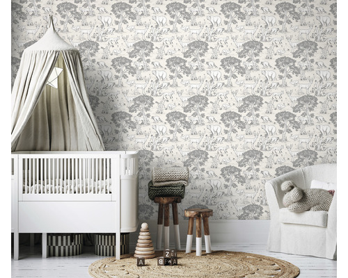 Barnrum med väggtapet, spjälsäng och dekoration