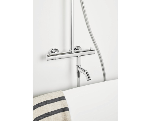 Duschblandare i krom med handduk