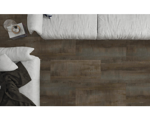 Toppvy av ett rum med golv i träutseende och en säng