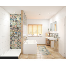 Badrum med dusch, badkar, handfat och mönstrade kakelplattor