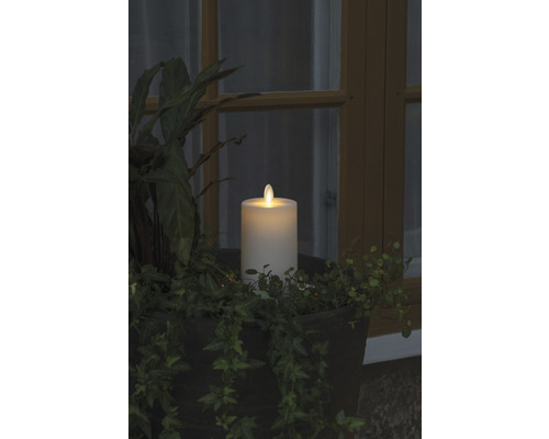 Dekorativ LED-ljus med växter i en planteringslåda