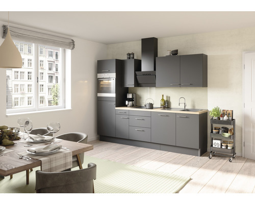 Modernt grått inbyggnadskök med matbord och stolar