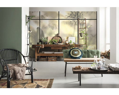 Vardagsrum med arbetsbänk, sittgrupp och dekorationer i rustik stil