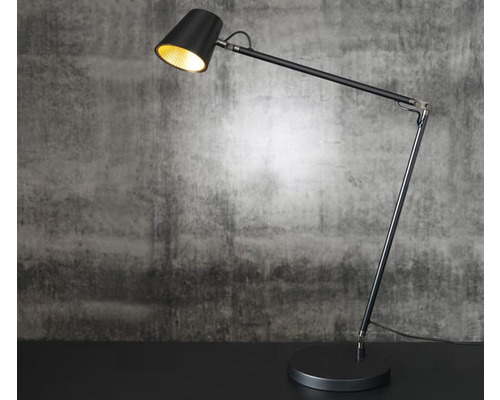 Svart golvlampa med justerbar arm och rund fot