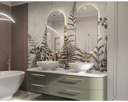 Ljust badrum med dubbla handfat, speglar och blommig tapet för en vänlig atmosfär.