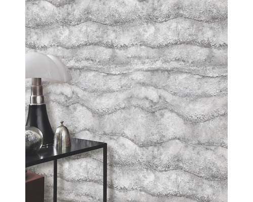 Närbild av en vägg med tredimensionell vågig tapet