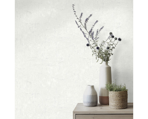 Dekorativ tapet med blomsterarrangemang på en skänk