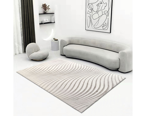 Vardagsrum med matta med vågmönster, soffa och fåtölj