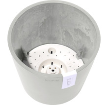 Invändig vy av en grå blomkruka med bevattningsinsats