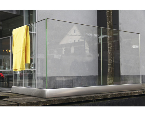 Glasräcke med rostfri ram och gul duk