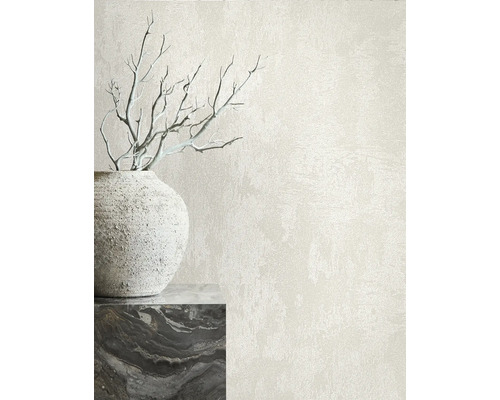 Ljus väggdekoration med putsstruktur, vas och dekoration