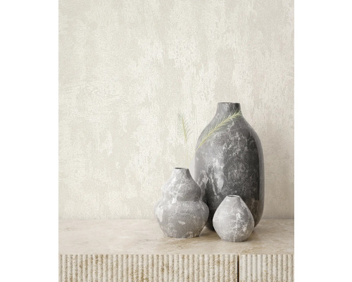 Dekorativa grå stenvaser på ett bord