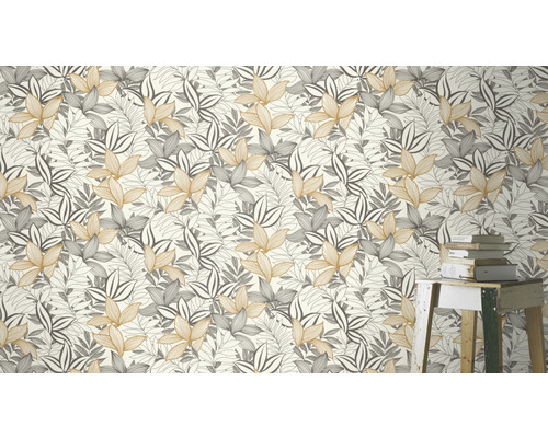Tapet med bladmönster i guld och grått