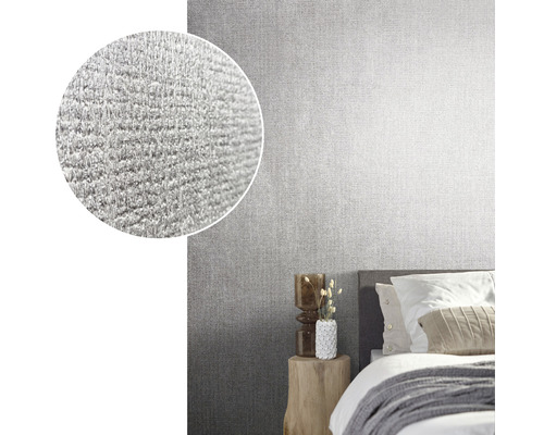 Sovrum med grå strukturtapet och förstorad detaljvy av tapetens yta.