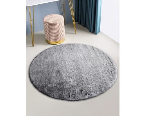 Grå rund matta i rummet