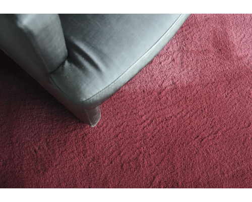 Närbild av en soffa på en matta