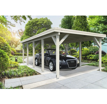 Bil i trä carport i trädgården