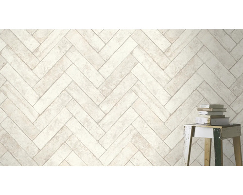 Ljust väggkakel i fiskbensmönster