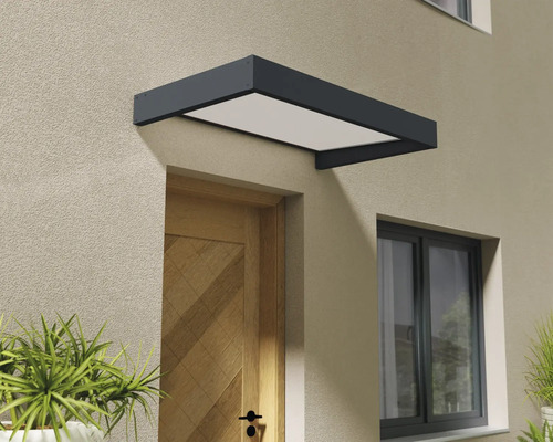 Dörrtak ovanför en trädörr på en fasad