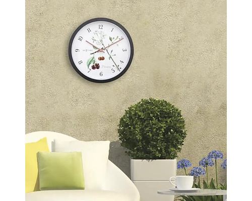 Väggklocka med växtmotiv för utomhusbruk