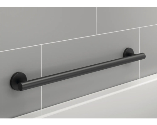 Svart badrumsbygel för väggmontering på en grå vägg