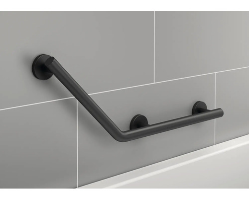 Svart badrumshandtag monterat på en vägg