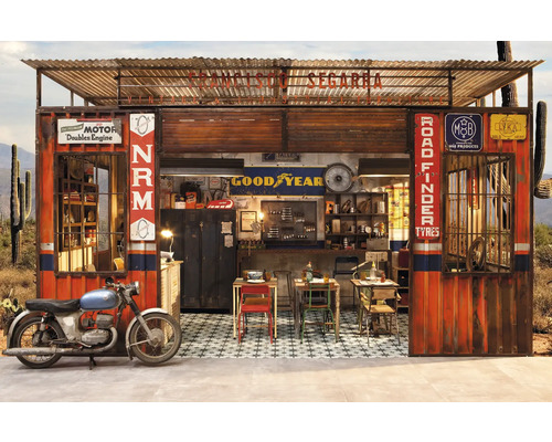 Verkstad i vintagestil med motorcykel i västerländsk stil