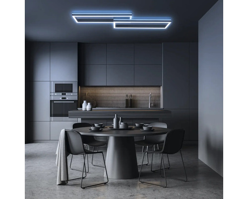 Modern köksdesign med matbord och LED taklampa