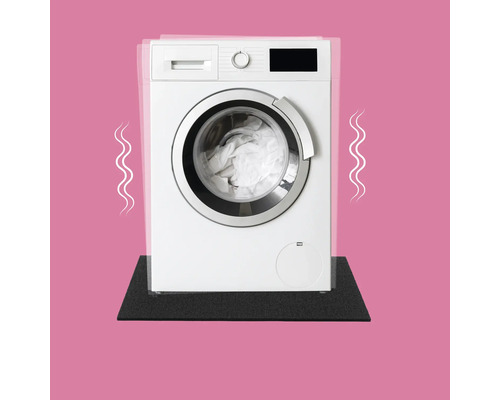 En tvättmaskin står på en vibrationsdämpande matta.