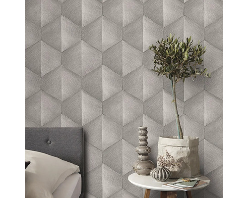 Mönstrad tapet med geometrisk design i sovrummet.