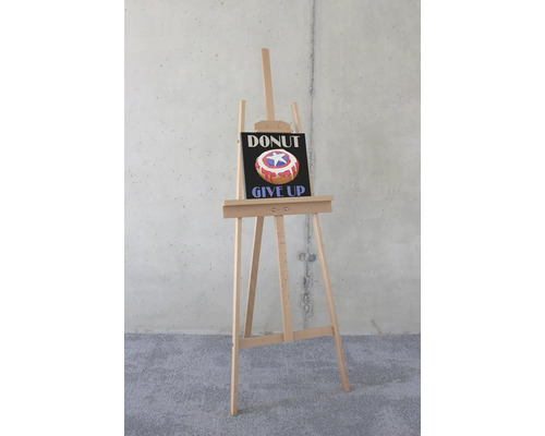 Staffli med en bild av en munk med texten ''Donut Give Up''
