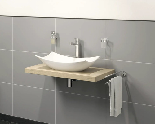 Badrumstvättställ med tvättställsskål, armatur, tvåldispenser, tandborstmugg och handdukshållare