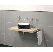 Modernt badrum med tvättställsskål, tvättställsplatta, blandare och handdukshållare