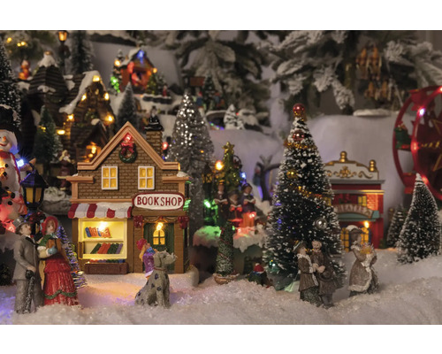 Julby scen med bokhandel, teater, figurer och träd