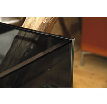 Detaljvy av ett akvarium med en svart ram