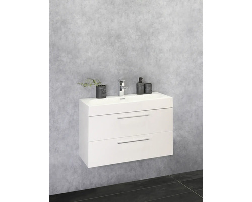 Modern badrum med vitt tvättställsskåp och två lådor