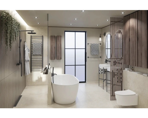 Ljust badrum med fristående badkar, dusch, handfat och toalett