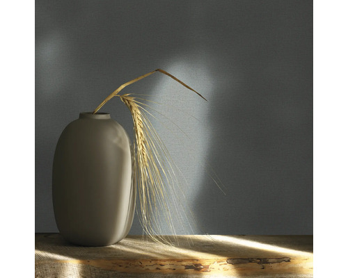 Vas med sädax på ett träbord