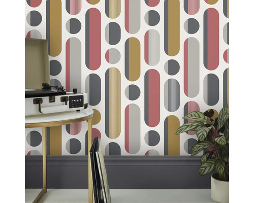 Tapet med geometriskt mönster, skivspelare och krukväxt