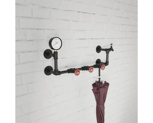 Vägghängare av rör med tryckmätare, kran och paraply