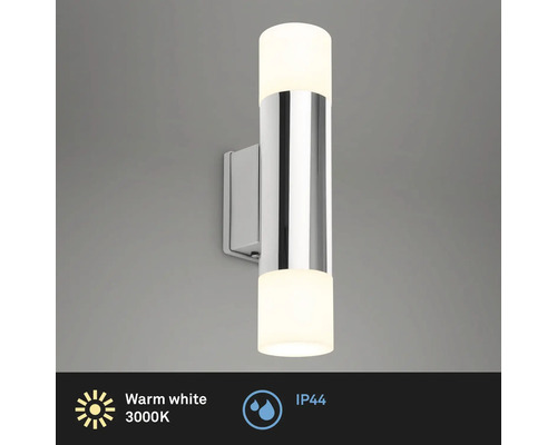 Vägglampa av metall och plast för inomhusbruk