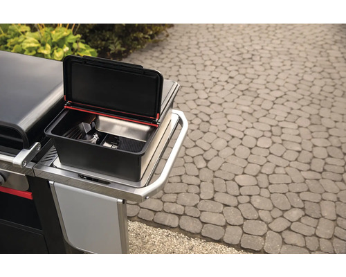 Grill med öppen förvaringsbehållare