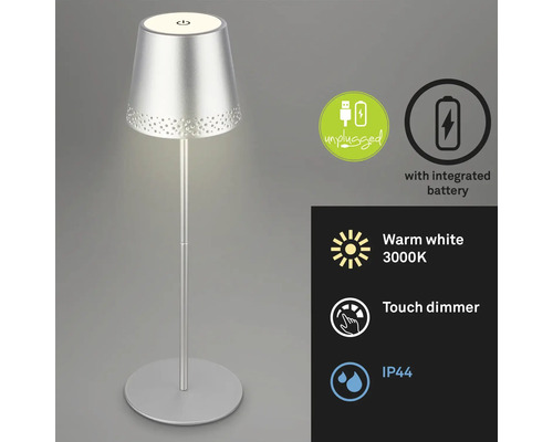 Silverfärgad bordslampa med integrerat batteri, touchdimmer och varmvitt ljus (3000K), skyddsklass IP44. Symbol för batteridrift utan kabel. Symbol för skydd mot stänkvatten.
