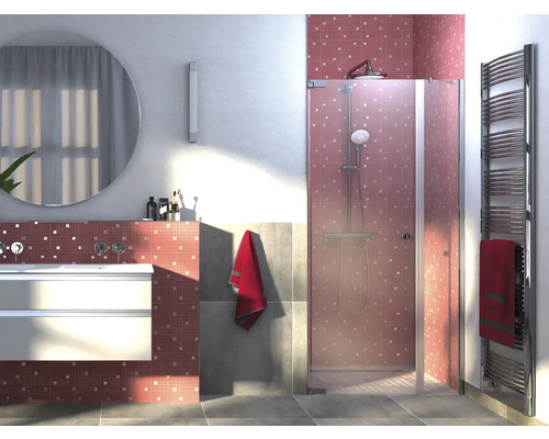 Badrum med dusch, handfat och radiator